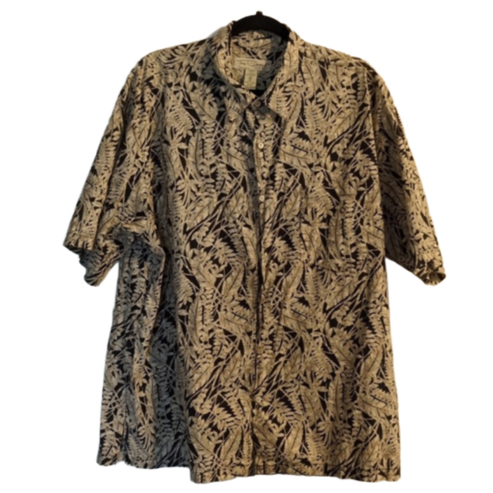 Elevate your wardrobe with Tori Richard stylish and functional button-up shirt